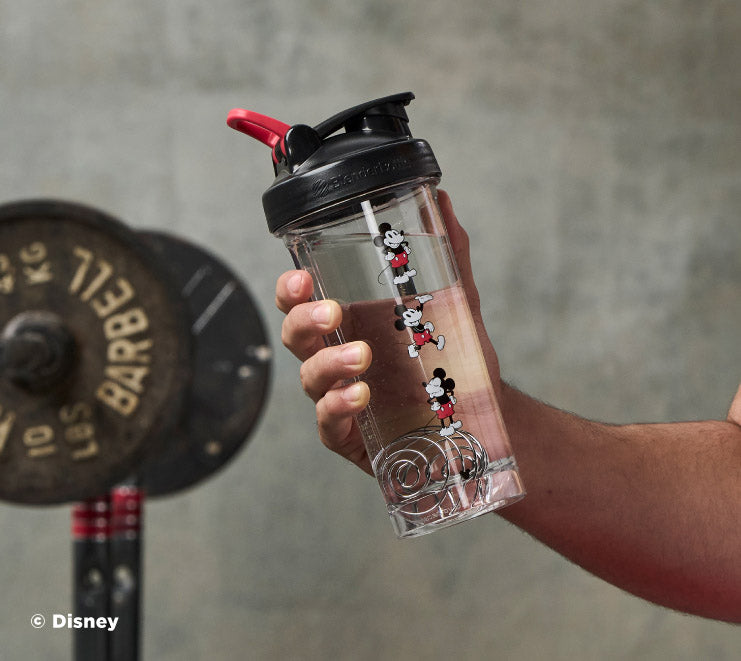 pro-series-r6 Mickey_Mouse_Protein_Shaker_Bottle_Being_Held_In_the_Gym.jpg